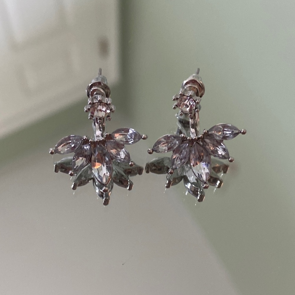 Silver studs with a flower cuff jacket